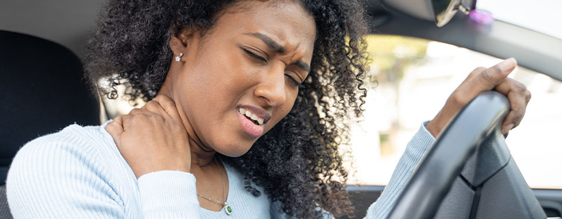 patient with neck pain in need of auto accident injury care in Allen