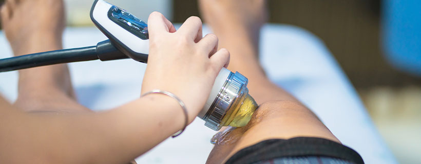 patient receiving shockwave therapy in Allen for auto accident injury pain relief